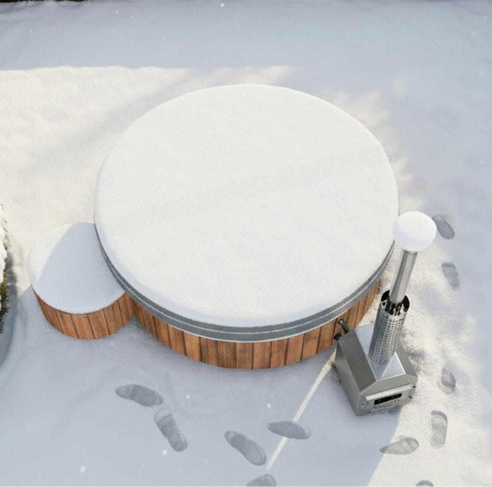 A snow-covered tub in winter, photographed from above, with snow and human footprints around it